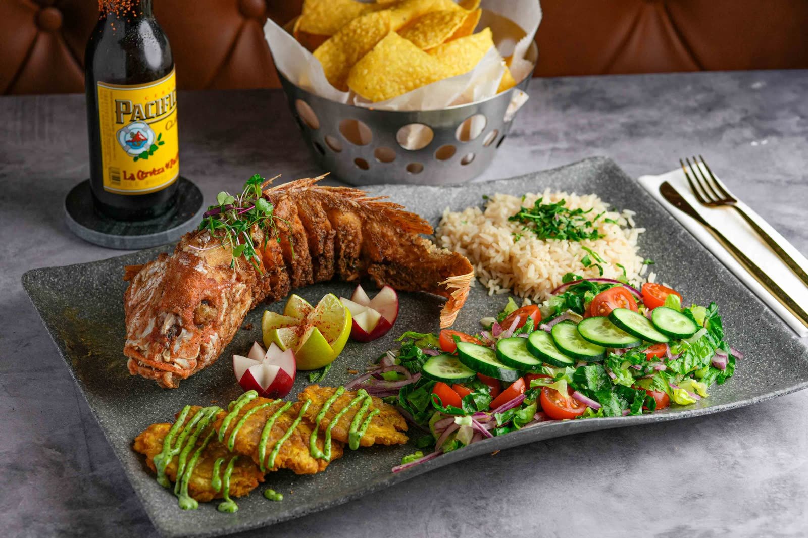 Whole red snapper a la talla served at Fuego Social Tacos and Tequila in Jacksonville Beach